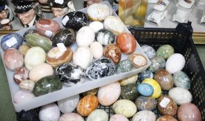 A quantity of assorted eggs  , to include marble, onyx and alabaster examples.