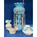 A 19th Century blue glass table lustre  ,  37cm high   and three items of Vaseline glass (4)