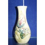 A Moorcroft vase  , 'Arum Lily' pattern on a yellow ground, baluster shaped, 28cm high