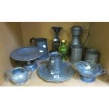 A collection of pewter,   to include a Tudric tankard and sugar bowl, a tazza, a quart tankard and