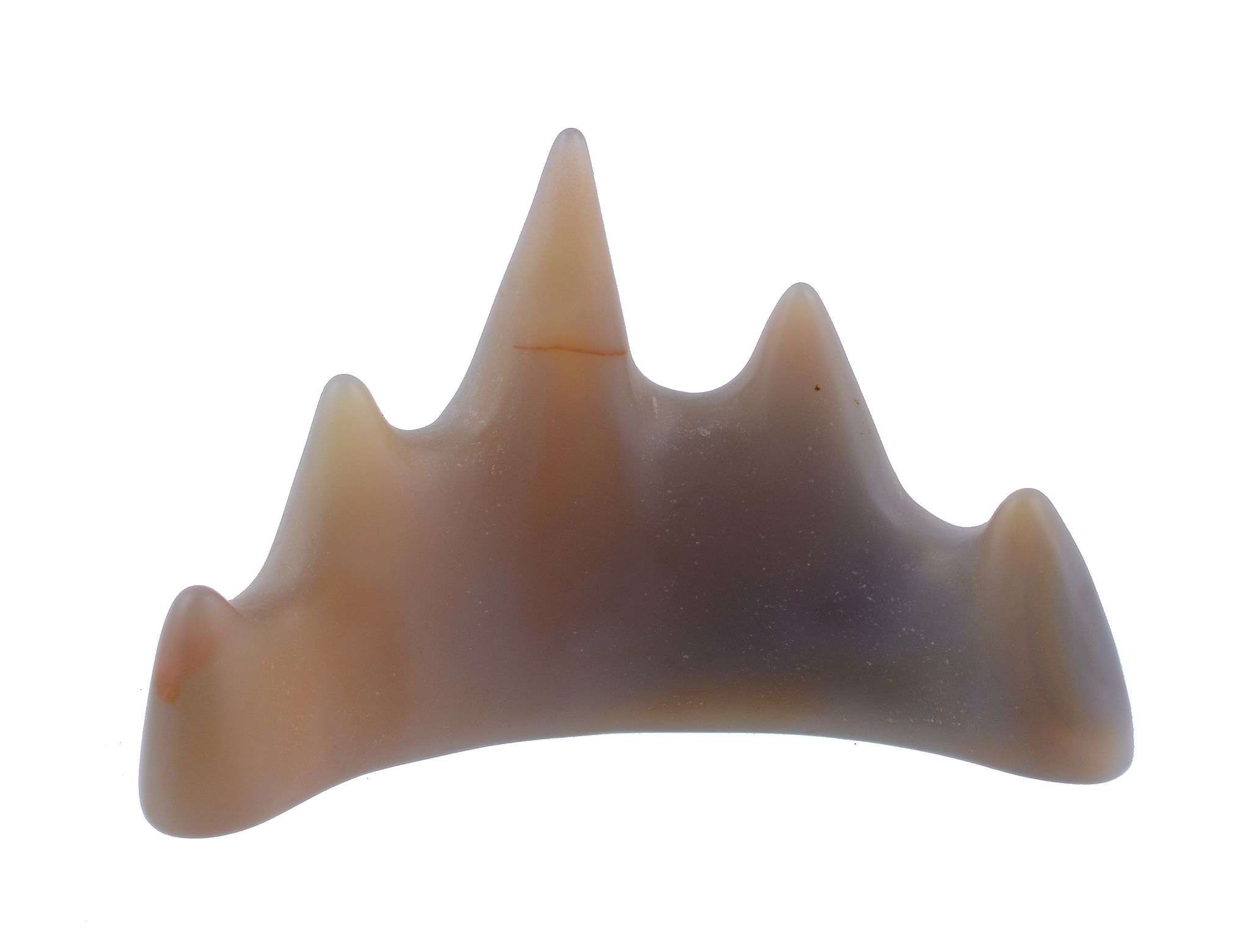 A Chinese agate brush-rest, Qing Dynasty, shaped as a five-peaked mountain... A Chinese agate