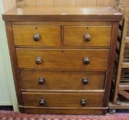 A Victorian style chest of drawers   mahogany finish with two over three drawers.92cm wide.