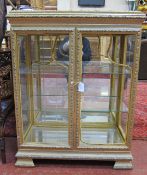 A "Gilded" Display Cabinet   with mirrored interior.69cm wide x 89cm high.