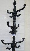 A Victorian style black painted cast iron hatstand  .200cm high.