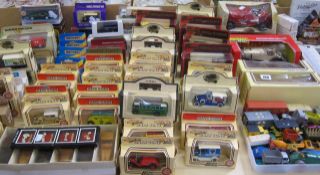 A mixed collection of boxed and loose diecast cars
