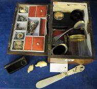 A collection of objects in a parquetry box,   including: a silver salt cellar, Birmingham 1901, an