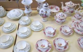 A Goode  &  Co part tea service,   floral decorated, another part teaservice, decorated with boy