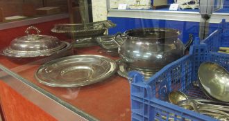 A quantity of silver plate   to include salvers, a tureen, serving dishes and flatware