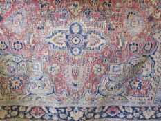 Three worn Middle Eastern rugs