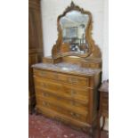 A 19th Century French walnut commode   with a bevelled dressing mirror, red veined top over four