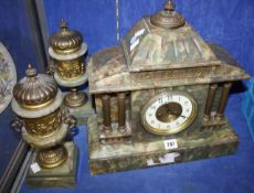 An early 20th Century green onyx and gilt metal mounted mantel clock  , 40m high with matching