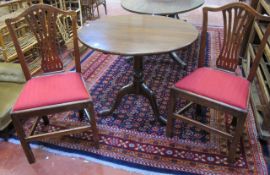 A Georgian style mahogany snap top table   on tripod base and two Hepplewhite style chairs.