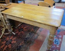 A Victorian pine kitchen table   with a single end drawer on turned supports.137cm x 84cm