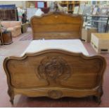 A 19th C French walnut double bed   with Rococo scrolled headboard with mattress and base.197cm x