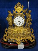 A French 19th Century mantel clock,   39cm high (missing glass dome)