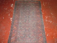 A Hamadan rug   106 x 180cm
