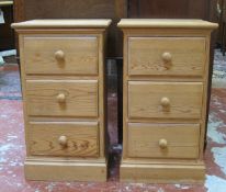 A pair of pine, bedside chests and large two tier coffee table.