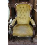 A Victorian mahogany armchair   with button back upholstery