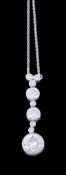 A diamond pendant , the pediment with a trio of brilliant cut diamonds to a...  A diamond pendant  ,