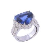 A sapphire and diamond ring, the heart shaped sapphire in a claw setting  A sapphire and diamond