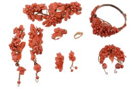 A coral brooch and side panels, the coral in the form of twisting clusters...  A coral brooch and