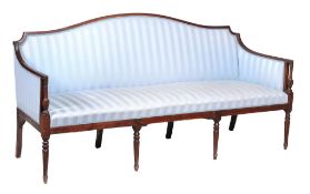 A   mahogany three-seat sof a in Regency style ,   20th century, the arched back and arms with