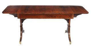 A George IV rosewood and brass inlaid sofa table  , circa 1825, by John Kendall  &  Co. the