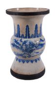 A Chinese blue and white vase, 19th century,   painted with raised decoration of figures on