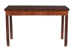 A mahogany serving table in George III style  , 20th century, the rectangular top with moulded edge