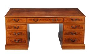 A walnut and burr walnut partners desk in George III style  , of recent manufacture, the gilt