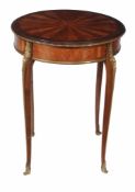 A French mahogany and kingwood circular occasional table, in Louis XVI style  , late 19th/ early