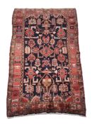 A Caucasian style long rug  , approximately 270 x 137cm,   together with another Caucasian style