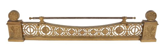 An Empire gilt bronze and iron mounted adjustable fender,   early 19th century, with horizontal