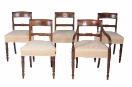 A set of five Regency mahogany dining chairs,   circa 1815, to include an armchair, each with