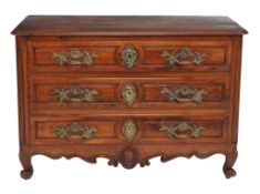 A Louis XV fruitwood commode  , mid 18th century, with three long drawers above shaped apron