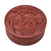 A Chinese cinnabar lacquer circular box and cover, Qing Dynasty,   carved with a sage under a pine