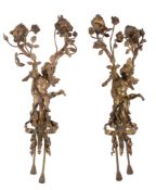 A pair of Continental gilt bronze twin light wall appliques,   second quarter 20th century, the