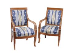 A pair of Louis Philippe mahogany armchairs,   circa 1840, the rectangular upholstered backs