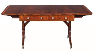 A Regency mahogany sofa table  , circa 1815, the rosewood and satinwood banded rectangular top