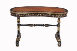 A Victorian ebonised and parcel gilt kidney shaped writing table , late 19th century, the leather