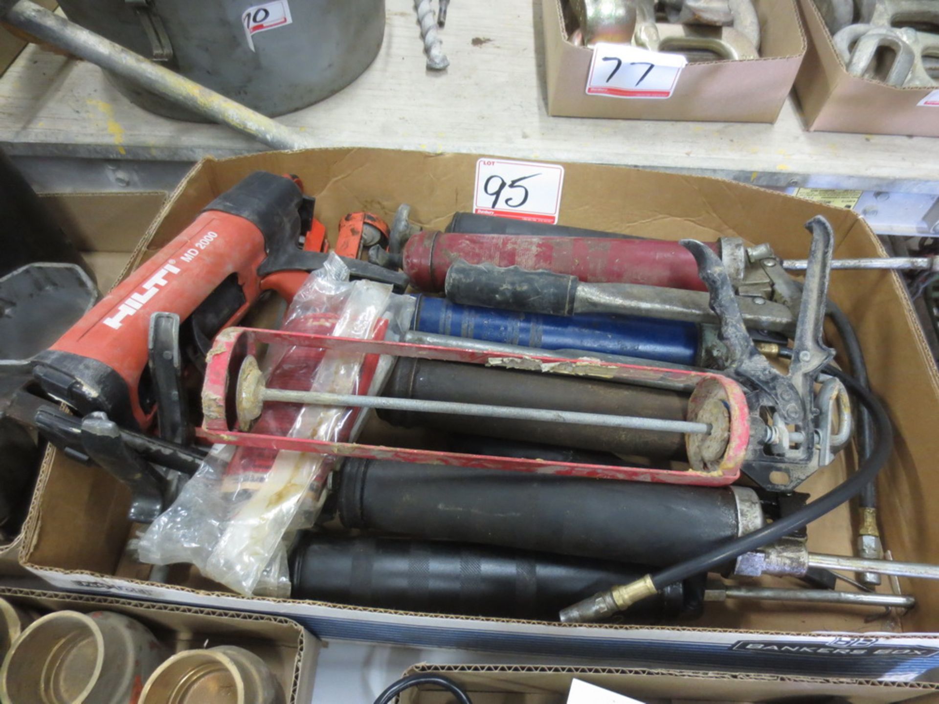 LOT - UNIVERSAL + HILTI GREASE + CAULKING GUNS