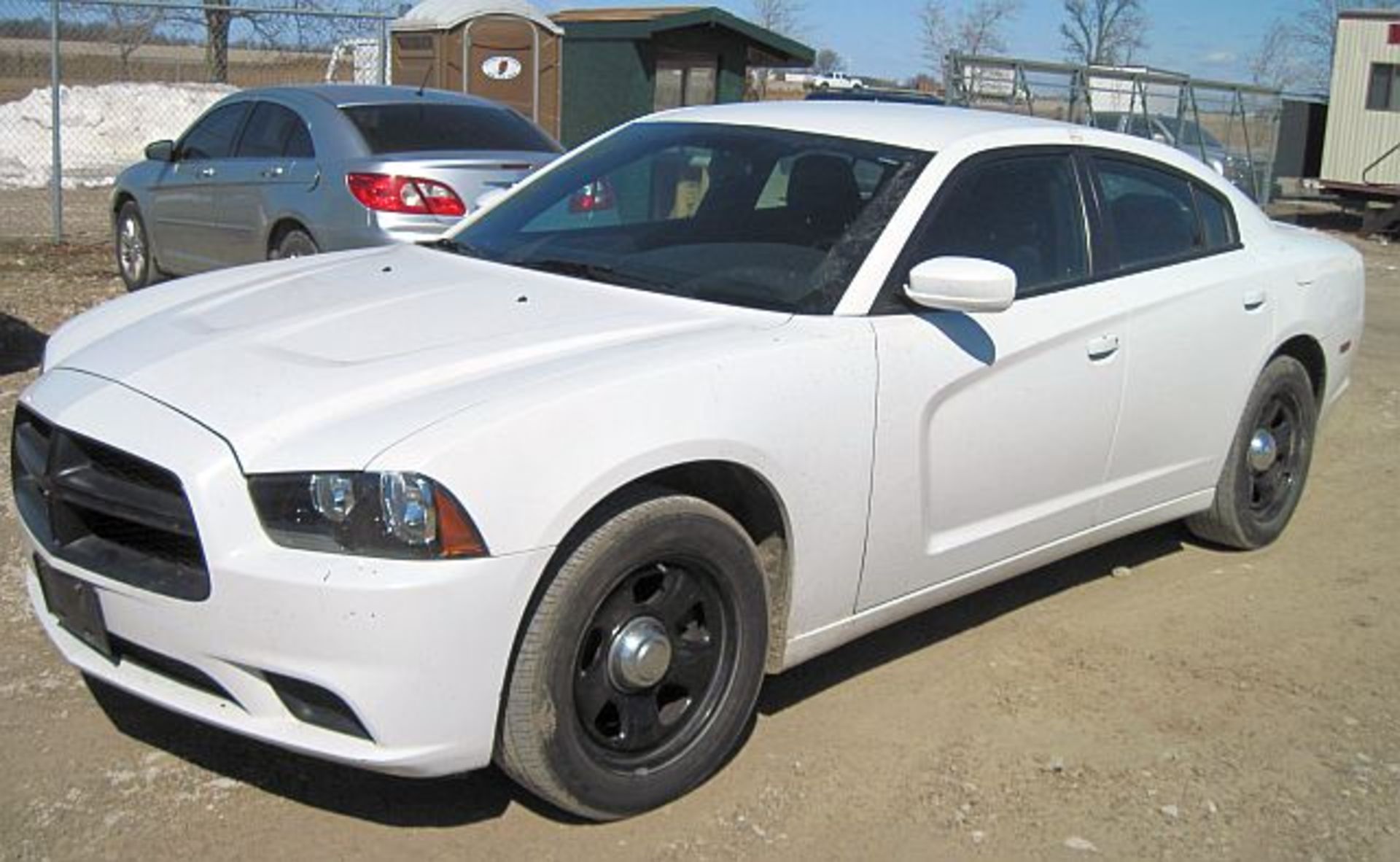 Lot 38 -  Lot# 38 2011 Dodge Charger 2011 Dodge Charger; 5.7L V8; tires fair, no dings or scratches;