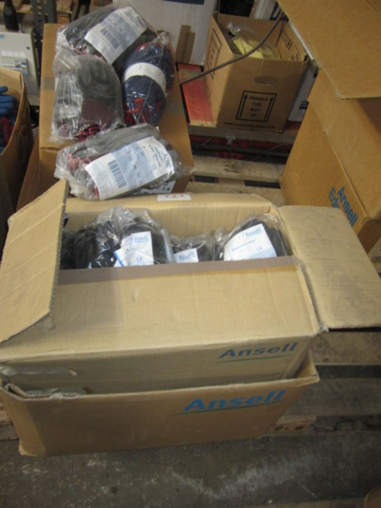 Pallet of assorted gloves including Ansell Sensilite, Ansell Hy Flex