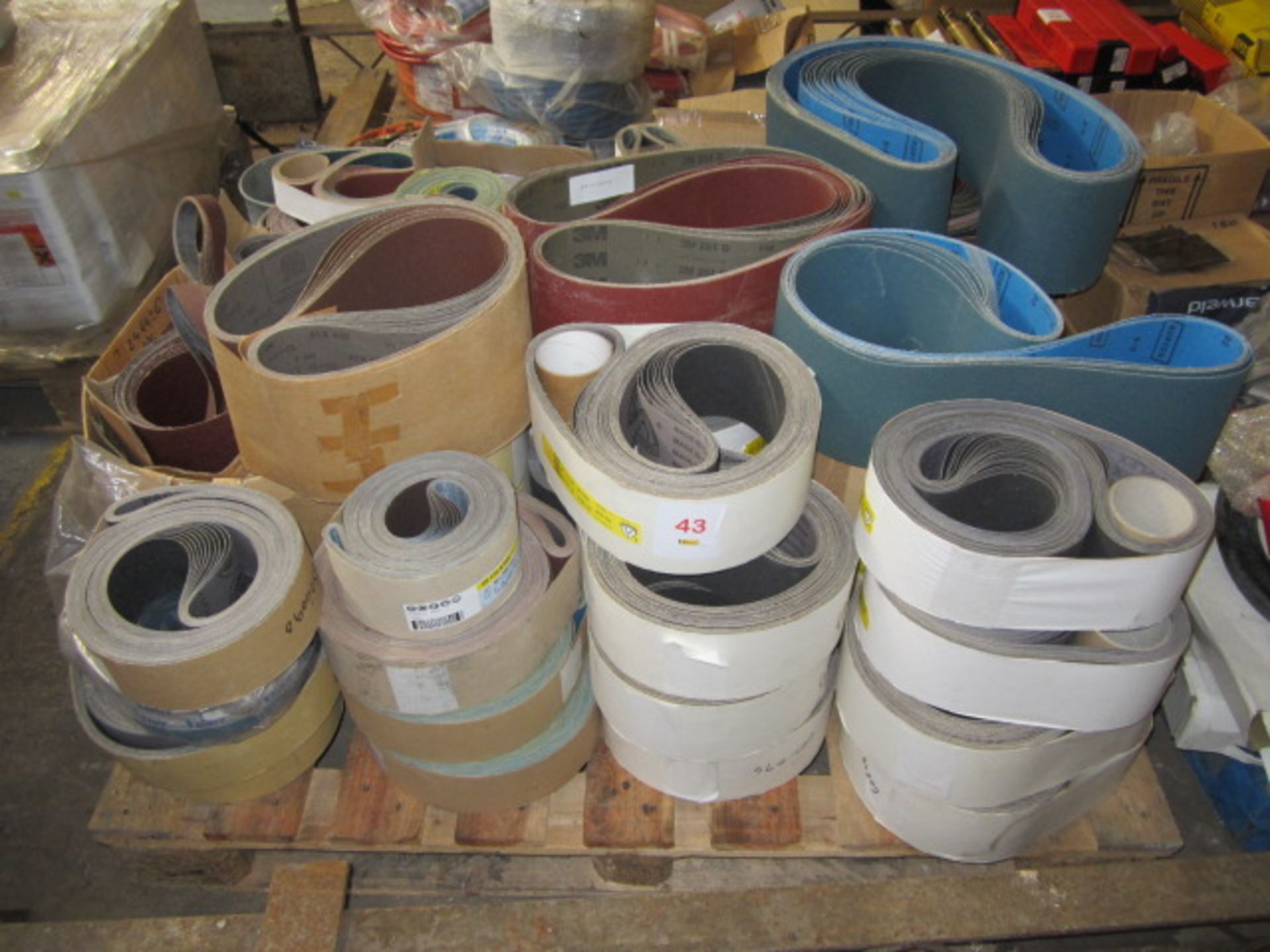 Pallet of assorted size abrasive belts