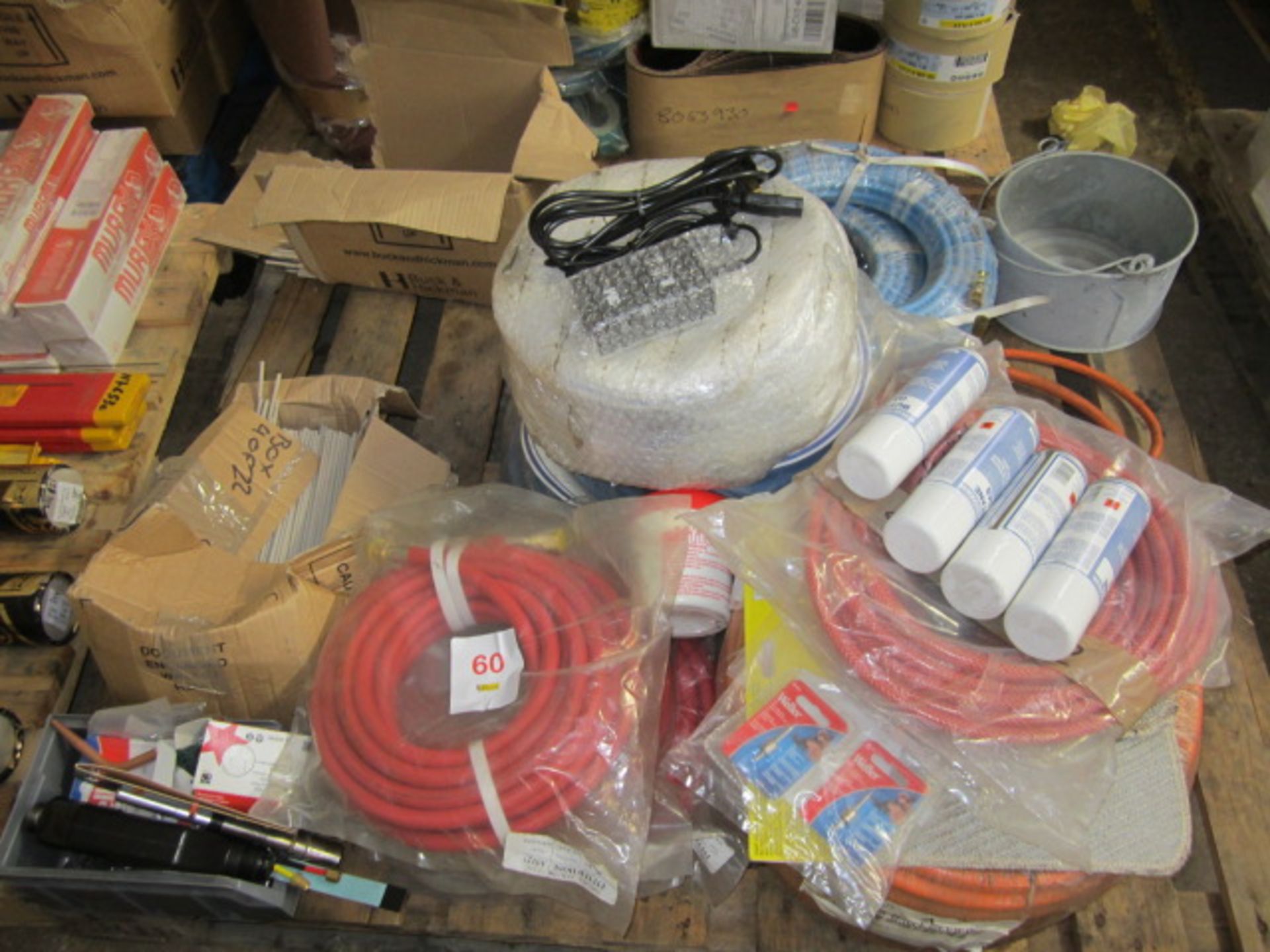 Pallet of welding and cutting consumables including acetylene fitted hoses, rods etc.