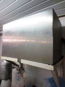 Stainless steel header tank mounted on wall brackets with outlet pipe, approx 750 x 420 x 500mm