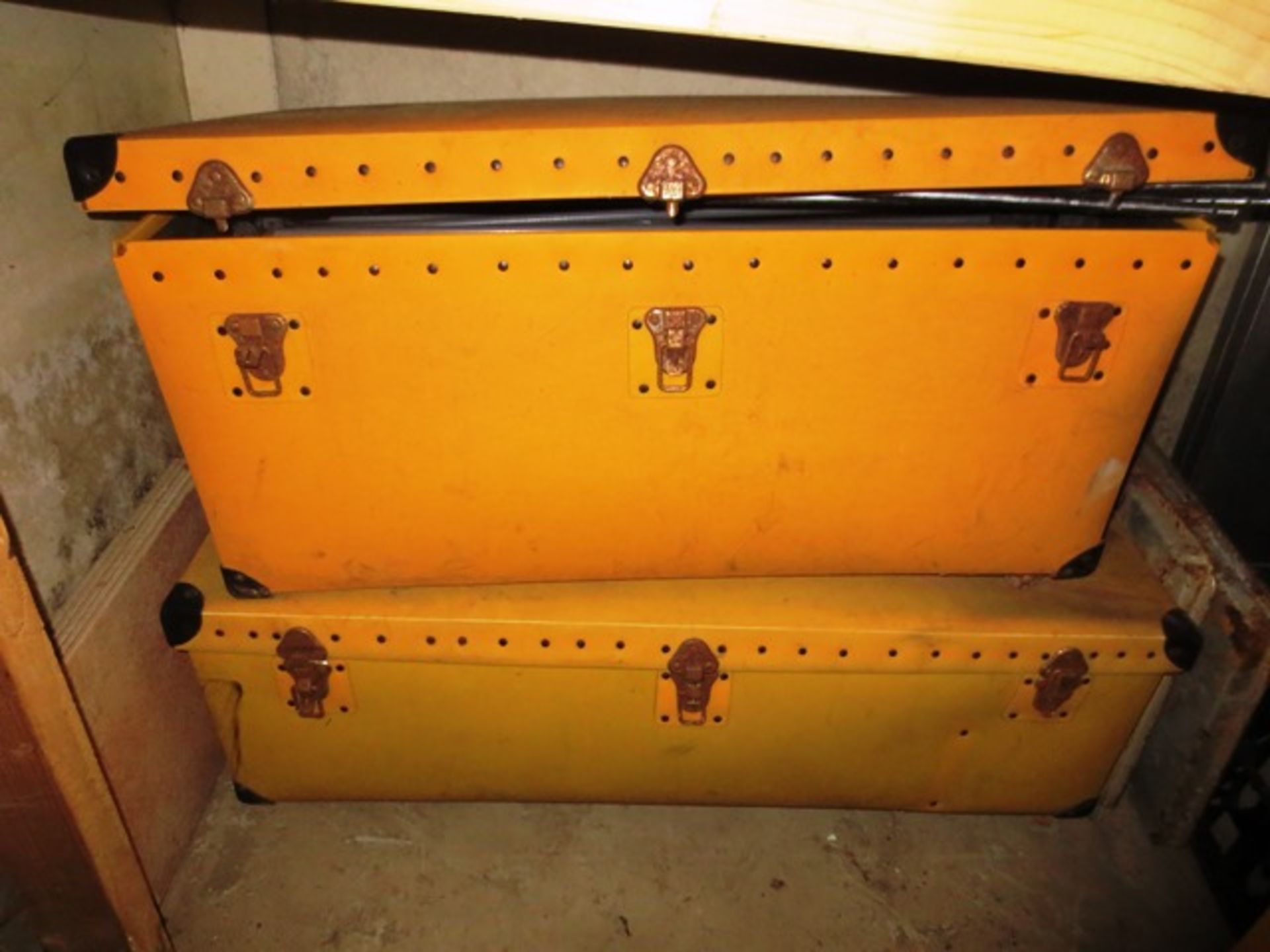 Two yellow, plastic coffee type storage boxes