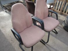 Two upholstered meeting chairs