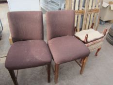 Two footstalls and one upholstered chair