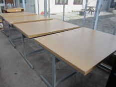 Four light wood effect office tables
